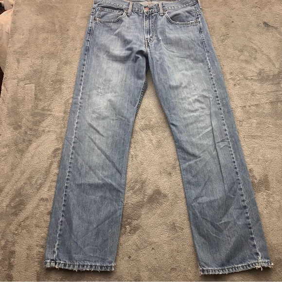 Levi’s 569 Light Wash blue denim distressed Men’s Size 32x32 - Picture 4 of 10